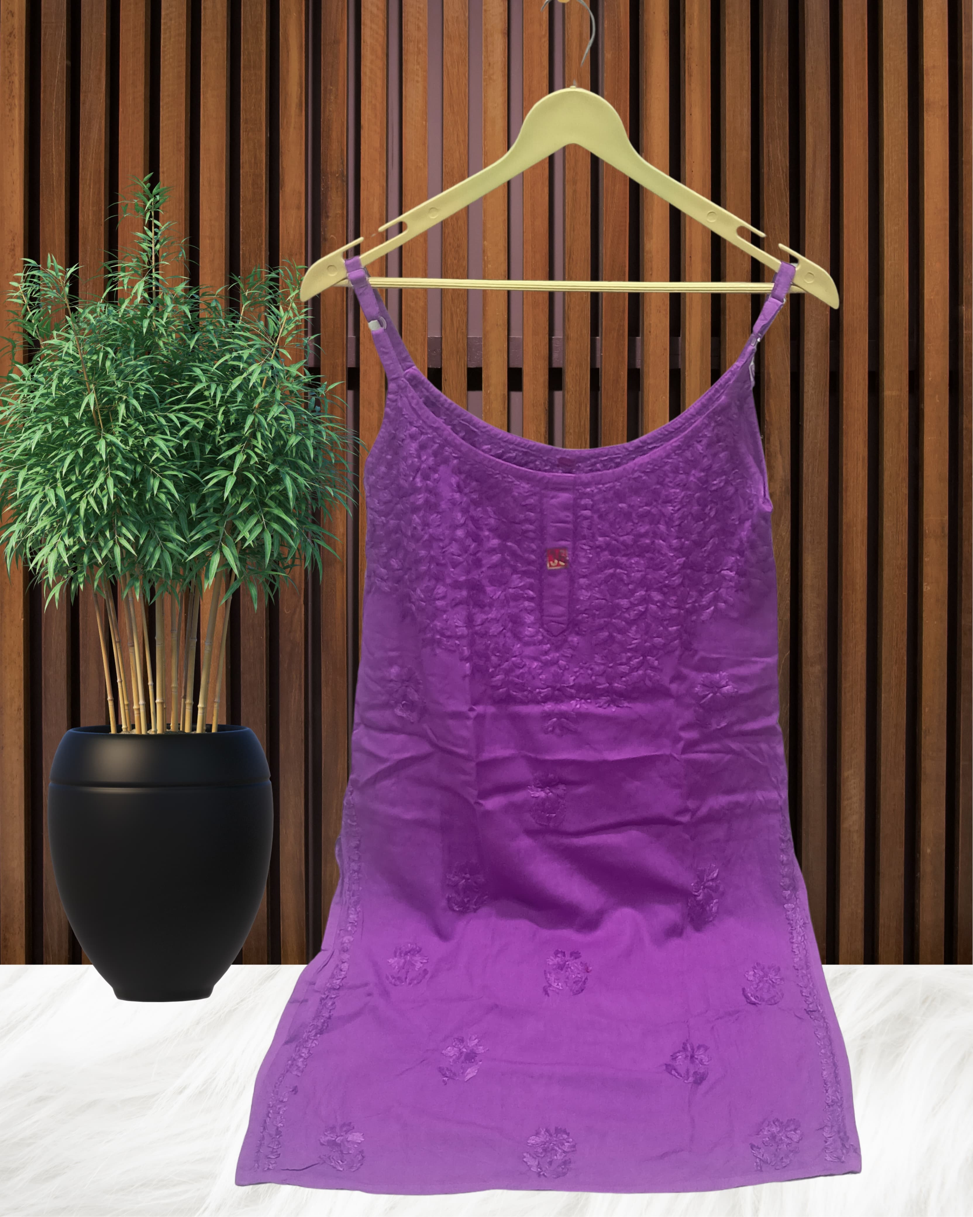 alt="Lucknowi chikankari tone to tone handwork sleeveless short top", alt="Noodle strap short chikankari top in premium rayon fabric", alt="Hand embroidered Lucknowi chikankari short top for women XXS to L", alt="Tone to tone chikankari work sleeveless kurti style top", alt="Premium rayon chikankari noodle strap short kurti top", alt="Lucknowi chikankari sleeveless short kurti with hand embroidery"
