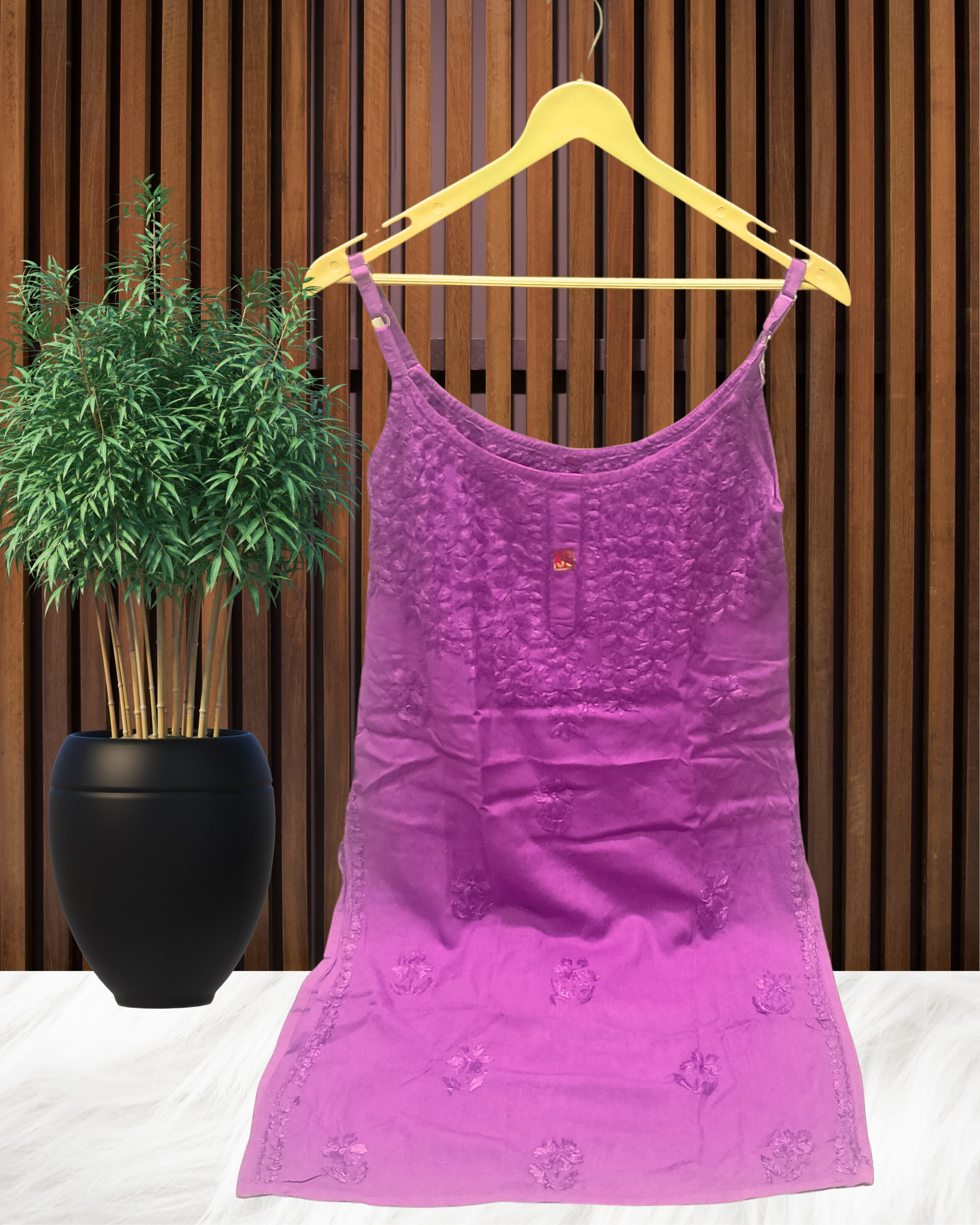 alt="Lucknowi chikankari tone to tone handwork sleeveless short top", alt="Noodle strap short chikankari top in premium rayon fabric", alt="Hand embroidered Lucknowi chikankari short top for women XXS to L", alt="Tone to tone chikankari work sleeveless kurti style top", alt="Premium rayon chikankari noodle strap short kurti top", alt="Lucknowi chikankari sleeveless short kurti with hand embroidery"