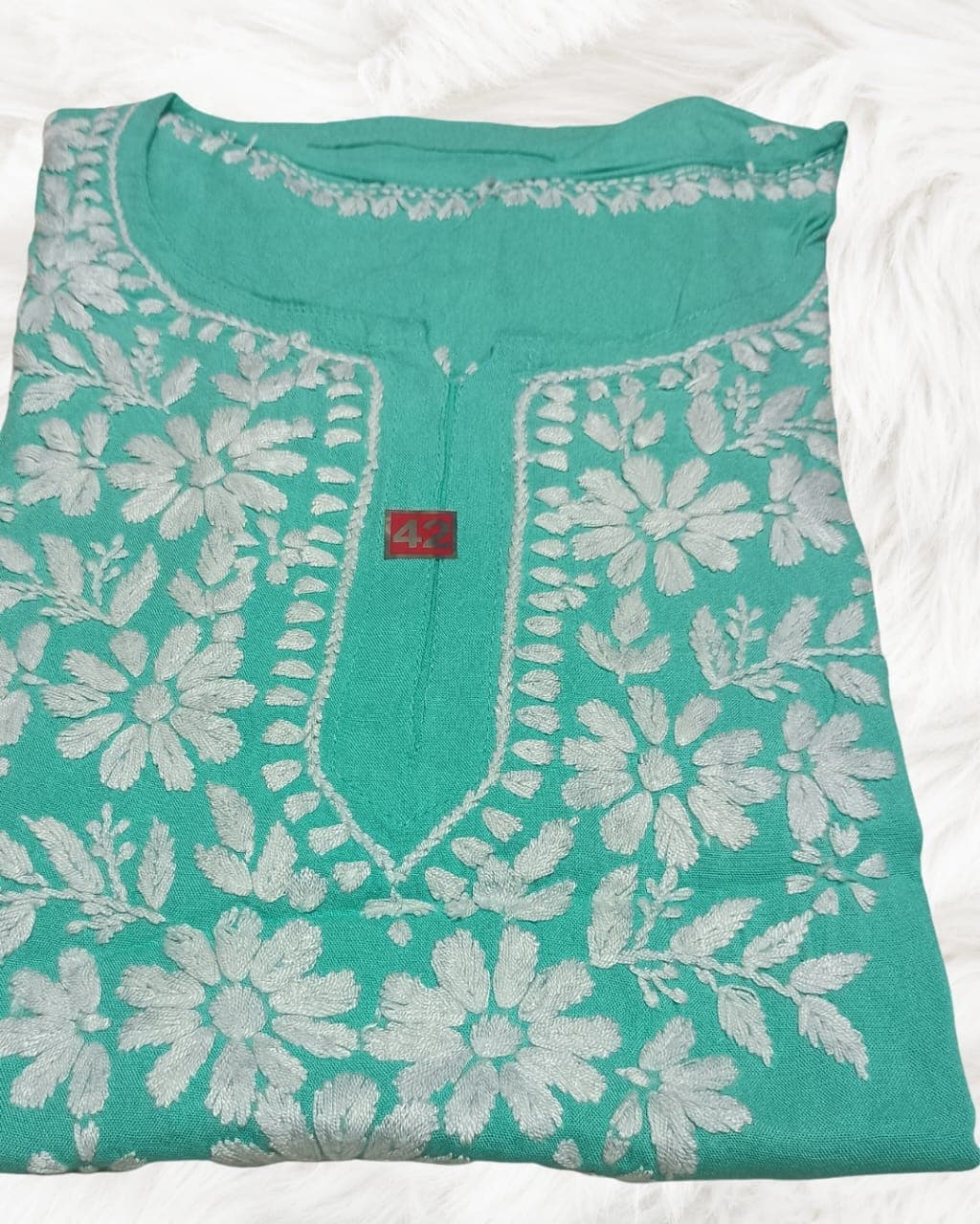 alt="Lucknowi handwork short chikankari kurti in reyon fabric", alt="White thread chikankari embroidery on coloured kurti", alt="Short chikankari kurti 30 inch for women", alt="Handmade Lucknow chikan short kurta with fine embroidery"