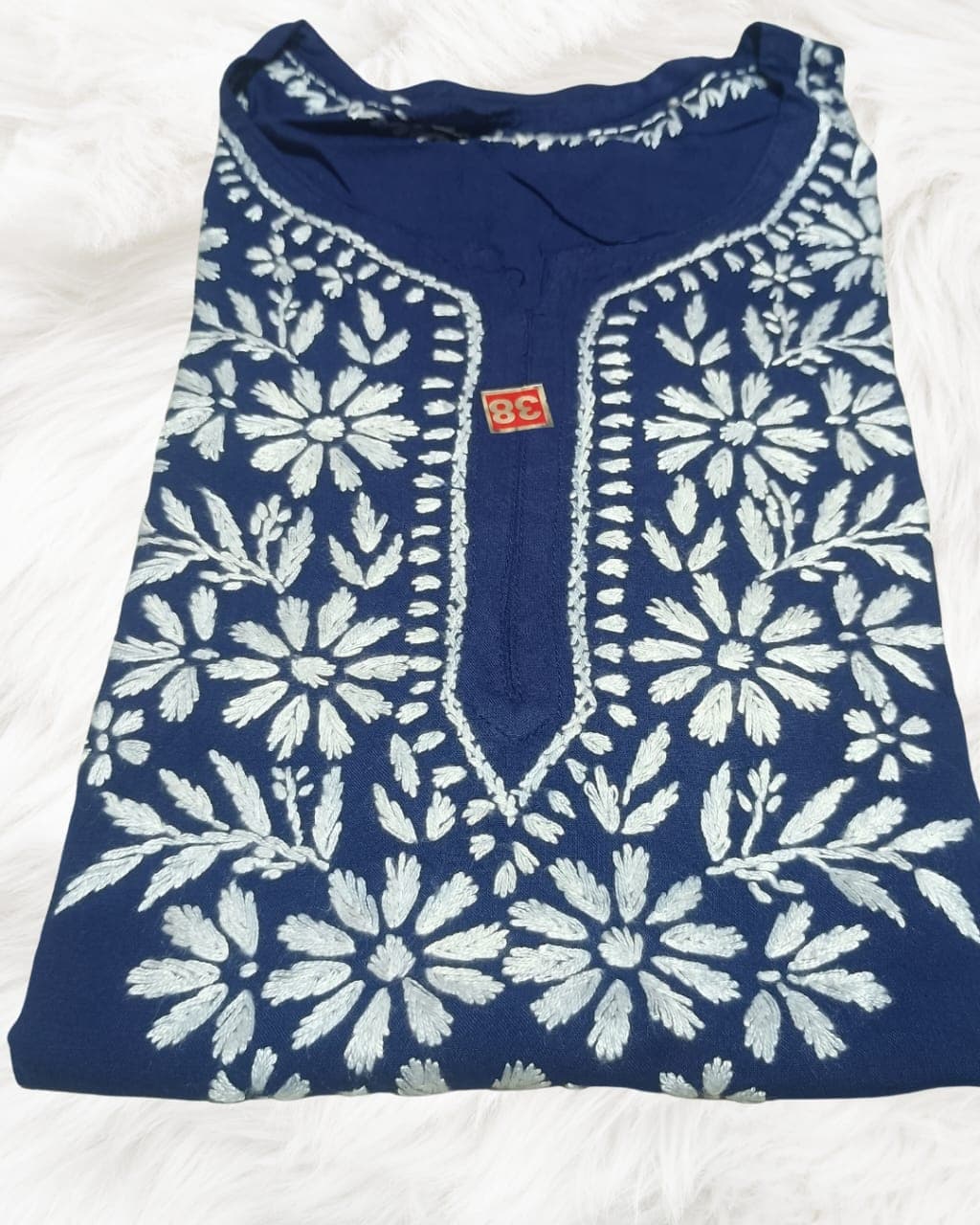 alt="Lucknowi handwork short chikankari kurti in reyon fabric", alt="White thread chikankari embroidery on coloured kurti", alt="Short chikankari kurti 30 inch for women", alt="Handmade Lucknow chikan short kurta with fine embroidery"